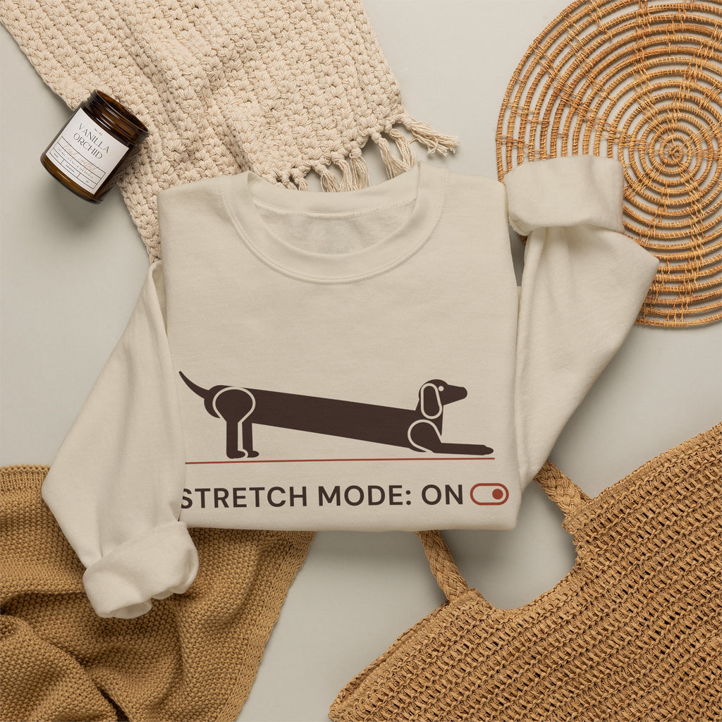 Stretch Mode On funny dachshund crewneck sweatshirt in Sand, flat lay