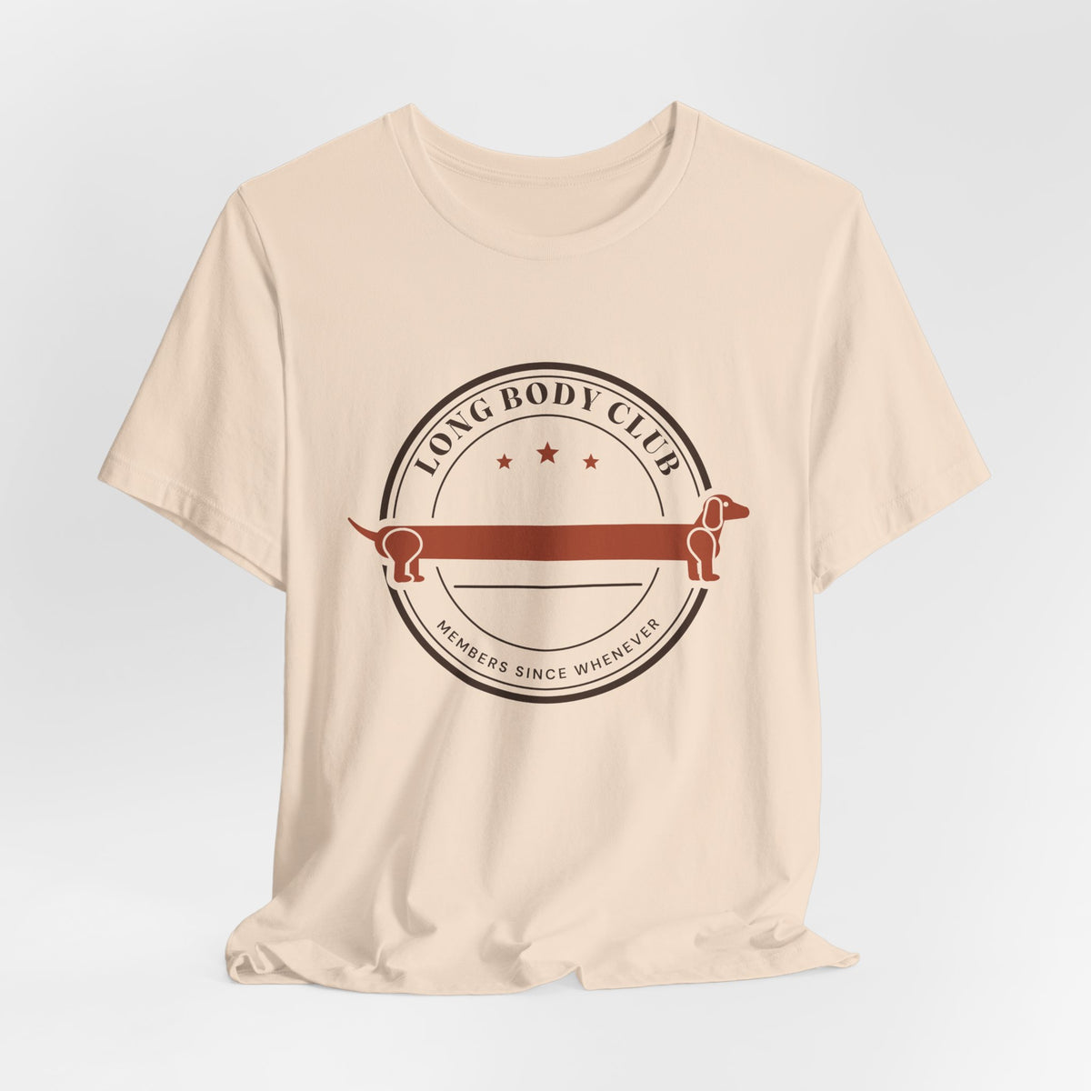 Long Body Club retro badge dachshund t-shirt in Soft Cream, flat lay